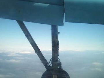 Hey, a wheel just fell off the aircraft, take a picture