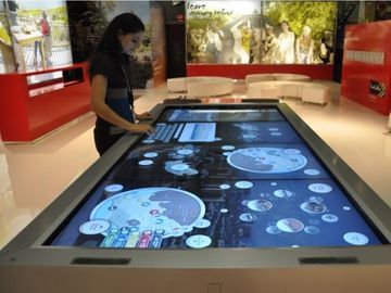 Behold the GIANT touch computer to discover travel experiences