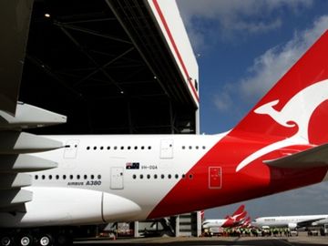 Qantas ordered to resume flights and resolve dispute, systems already back on track