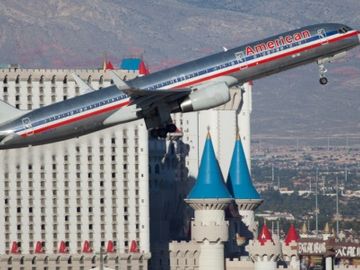 Travelport and American Airlines agree quick extension to distribution deal as talks continue