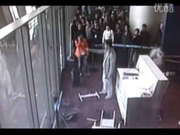 Chinese official loses his cool and smashes gate systems at airport [VIDEO]