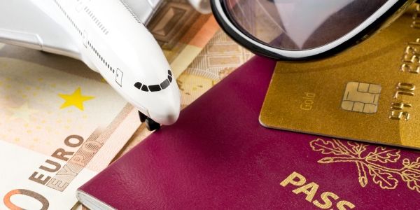 How might an online travel agency navigate airline card surcharges?
