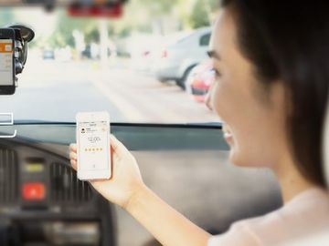 Uber unphased as China rivals create monopolistic merger