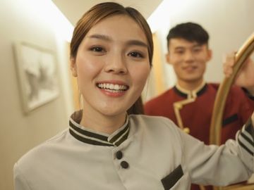 Chinese hotels try to balance high-tech and high-touch