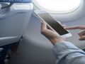 Airline passengers on wifi, in-flight entertainment and on-board activities