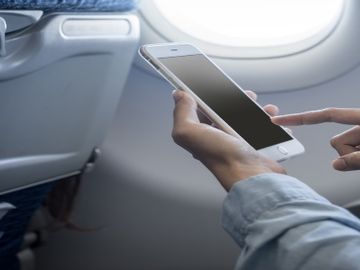 Airline passengers on wifi, in-flight entertainment and on-board activities