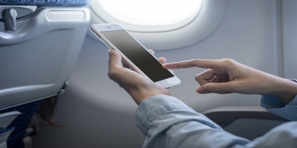 Airline passengers on wifi, in-flight entertainment and on-board activities