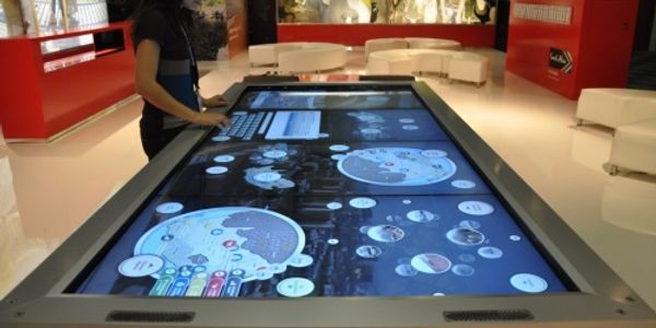 Behold the GIANT touch computer to discover travel experiences