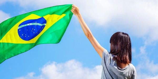 Didi starts to firm up global network, buys Brazilian partner