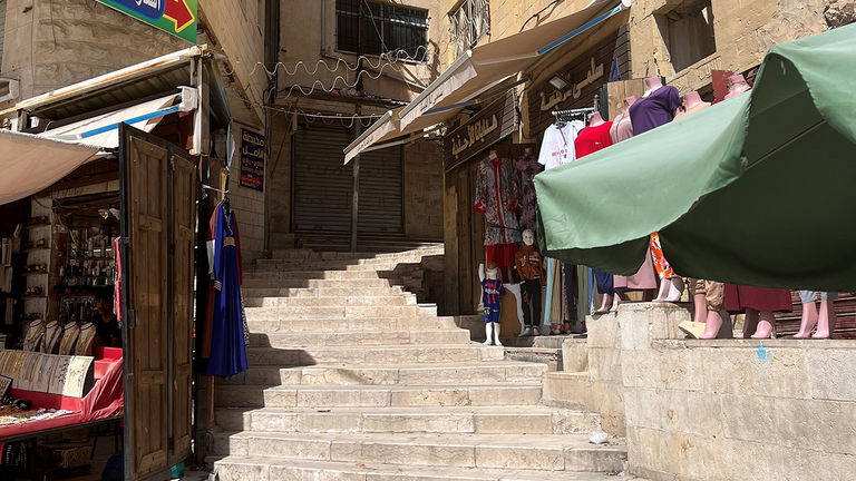 A local market laid out in a pedestrian corridor of As-Salt, Jordan.