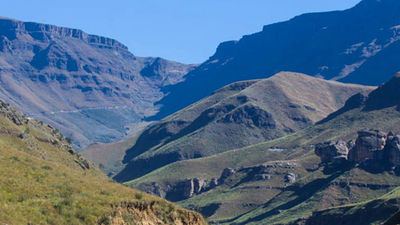 Before entering Lesotho, travelers will pass through a “no man’s land” of rolling hills and terrain. // © 2014 Devin Galaudet