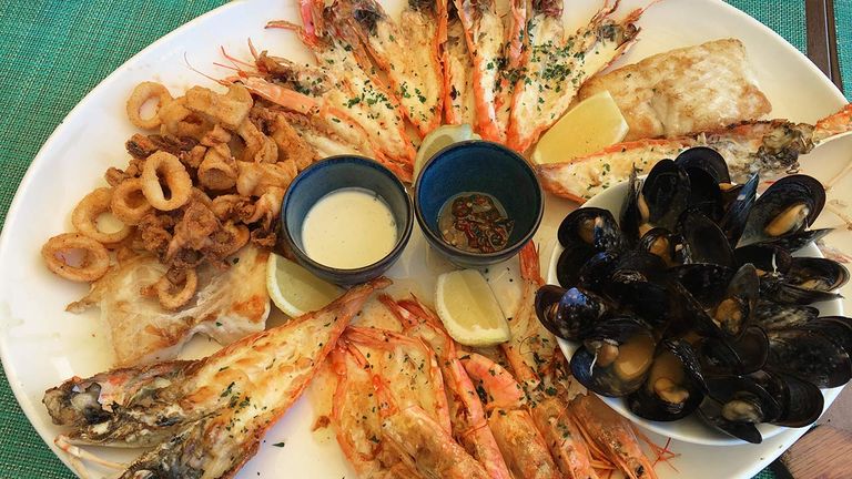Indulge in seafood at Two Oceans Restaurant.