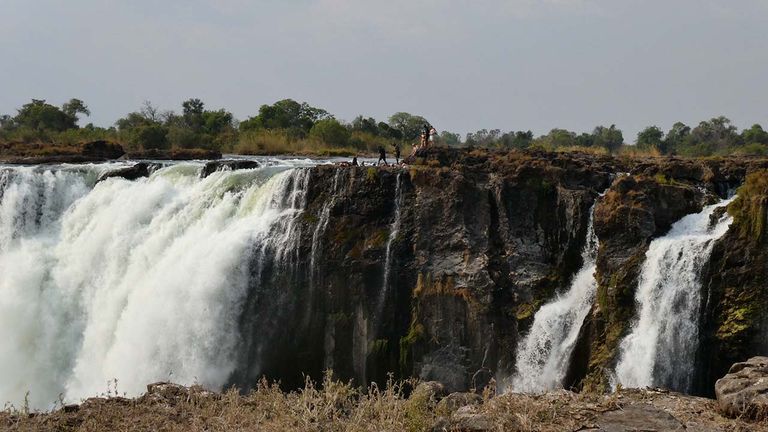 Devil’s Pool is a natural rock swimming pool atop Victoria Falls.