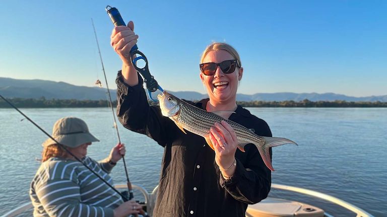 Catching and releasing an African tigerfish is one of the excursions offered by Zambezi Grande.