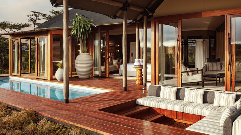Every suite features an outdoor deck area with mountain views.
