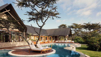 After a day of exploring and spotting wildlife, travelers can relax with a swim in the property's pool.