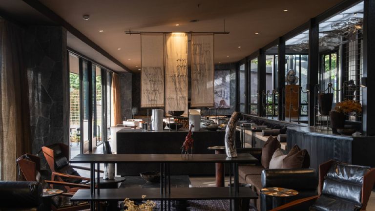The open-concept main building includes a large dining area and plenty of casual seating arrangements.
