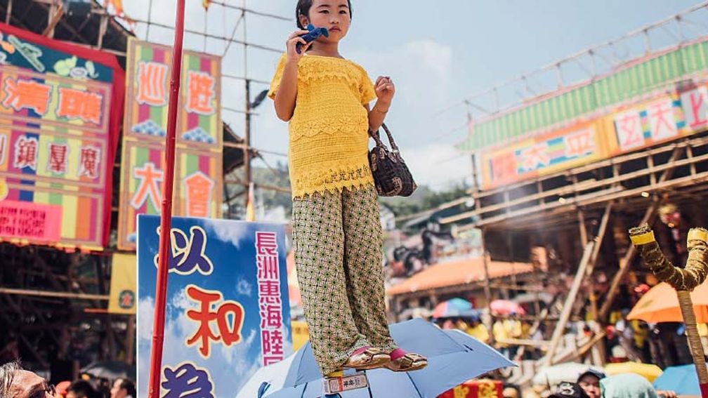 Thousands of people attend the annual parade at the Bun Festival on Cheung Chau Island. // © 2015 Anthony Kwan/Getty Images for Hong Kong Images 2