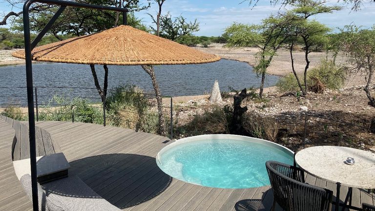 Camp Kala guests have their own private game viewing deck with a cold pool and wood-fired hot tub.