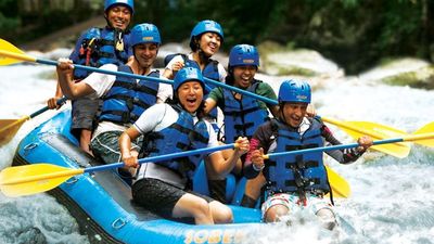 Rafters on Bali Sobek’s tour paddle through the lush scenery of Bali’s rainforest. // © 2013 Bali Sobek F