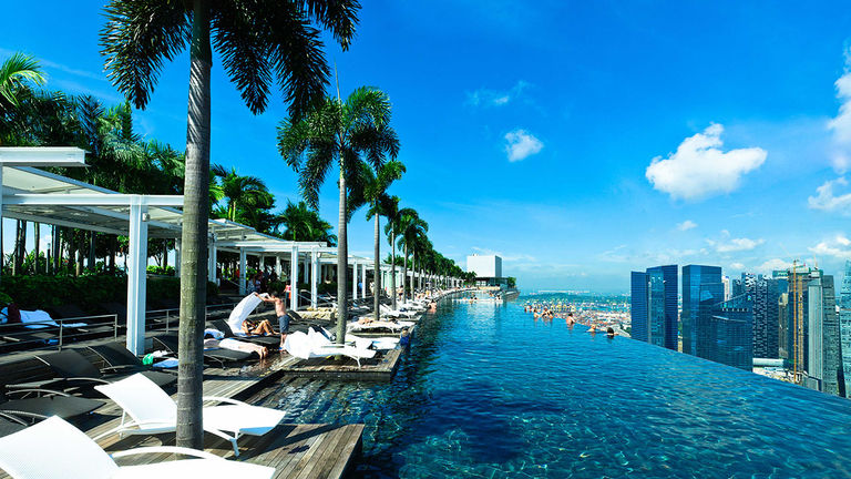 Marina Bay Sands’ 57th-floor Sands SkyPark includes an infinity pool offering views of Singapore.