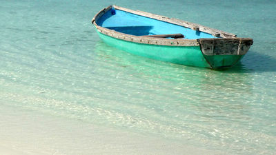 Kick back on white-sand beach of Agatti Island, about 285 miles off the coast of Kochi. // © 2015 Creative Commons user swissfrog
