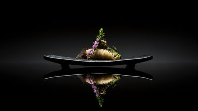 A dish of cold angel hair pasta with kombu, caviar and black truffle at three-Michelin-star Les Amis