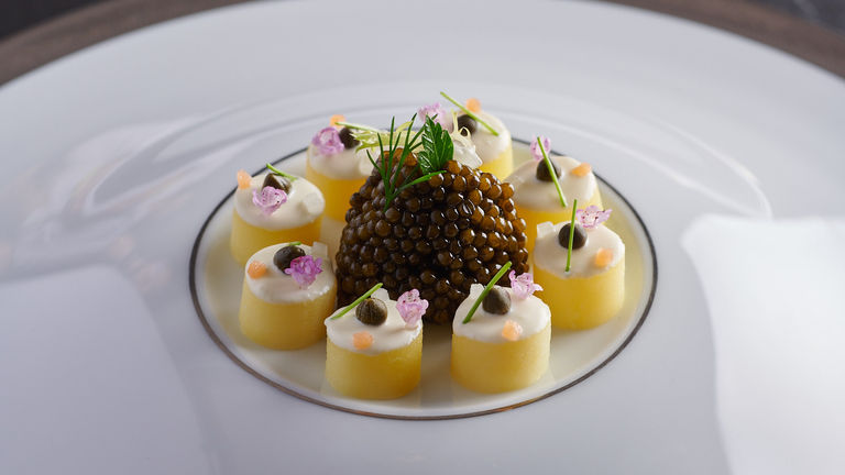 Caviar served on petals of roseval potatoes