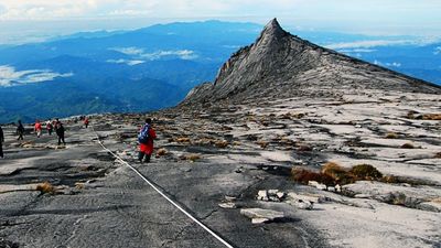 Mount Kinabalu is the fifth highest peak in Southeast Asia and is home to the continent’s only via ferrata, or iron road. // (c) 2013 Thinkstock F