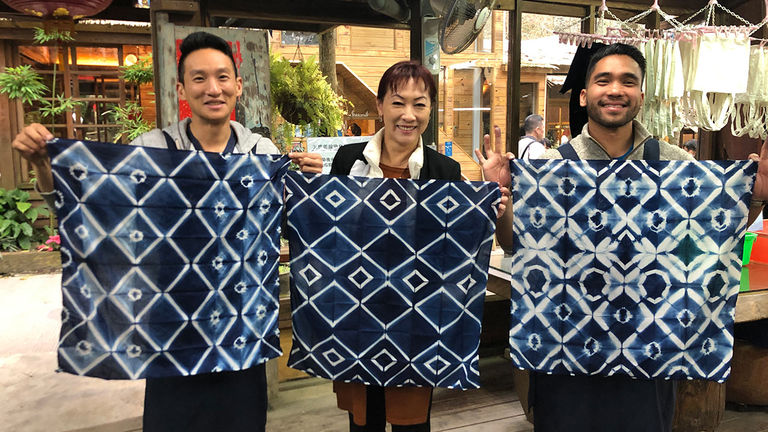 At Zhuo Ye Cottage, guests work with indigo dye.