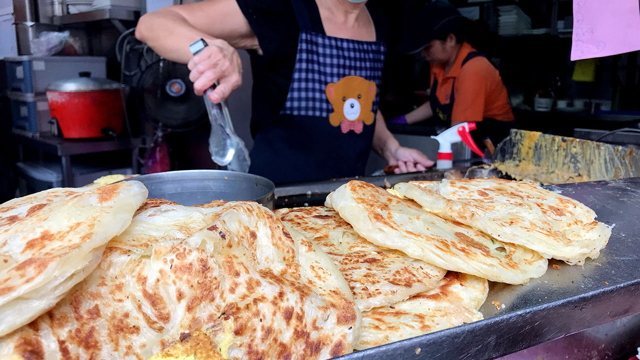 Tian Jin Onion Pancake serves up sizzling scallion pancakes.