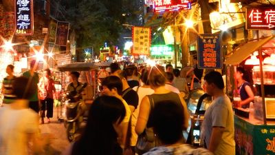 Street snacks abound in the night market, from meat skewers and dumplings to soups characteristic of the region. // © 2014 Shane Nelson