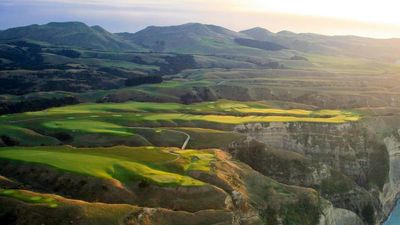 Visitors to New Zealand can stay on a vineyard or a golf course, such as the Cape Kidnappers Golf Course in Hawke’s Bay. // © 2014 Swain Destinations 2