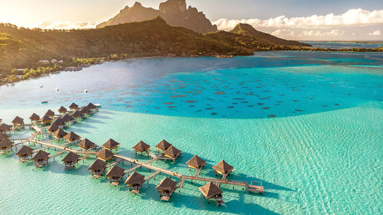 Advisors say the increased privacy of overwater bungalows, such as those seen here on Bora Bora, are highly appealing to travelers.