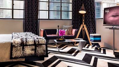 The rooms’ decor is “dessert-inspired” and features an elegant aesthetic with punches of bright color.  // © 2016 Adelphi Hotel