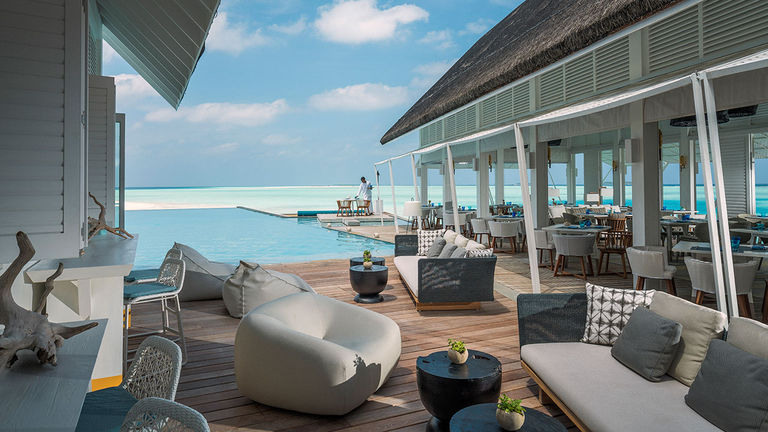 Blu Beach Club, at Landaa Giraavaru, offers dishes crafted by a Michelin-starred chef.