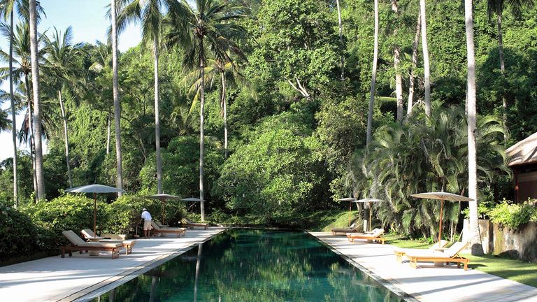 Amankila’s beach club pool offers a relaxing retreat.