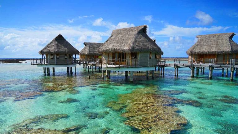 The high-end Le Tikehau by Pearl Resorts is home to 24 overwater bungalows.