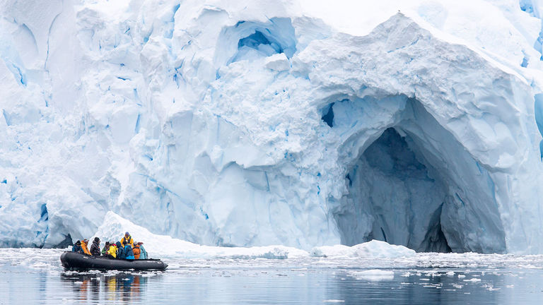 Travelers navigate around ice floes in Paradise Bay.