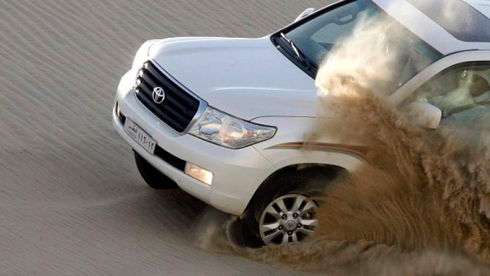 Go dune bashing in a four-wheel-drive vehicle. // © 2015 Gulf Adventures 2