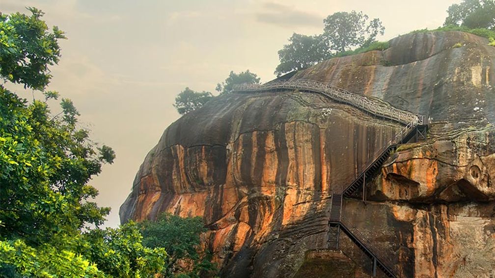 Located in Sri Lanka’s Central Province, Sigiriya features a rock plateau that is more than 600 feet higher than the surrounding jungle. // © 2016 iStock 3