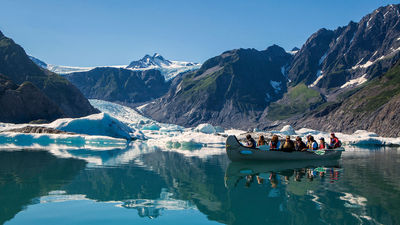 Canoe, kayak and hike among glaciers, marine life and bears at Kenai Fjords Glacier Lodge in Alaska.