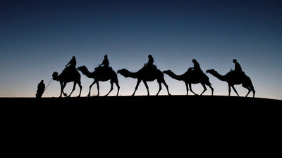 Travelers started the day with a pre-dawn camel ride in Morocco.