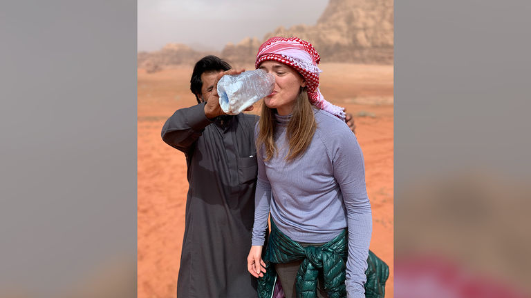 Yousef fed the writer fresh camel's milk, which, contrary to what her expression implies, tasted absolutely delicious.