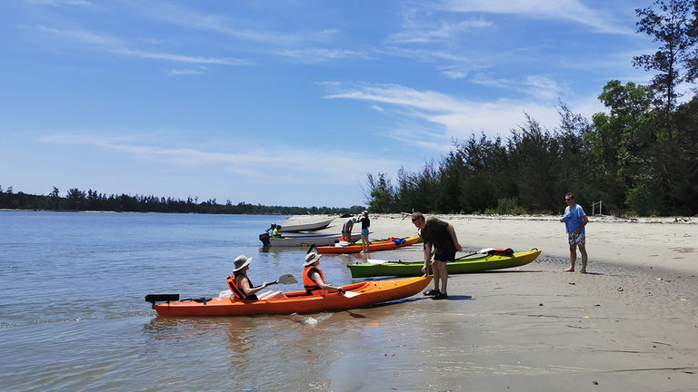 The itinerary ends with a peaceful kayaking excursion along mangrove-lined waterways.