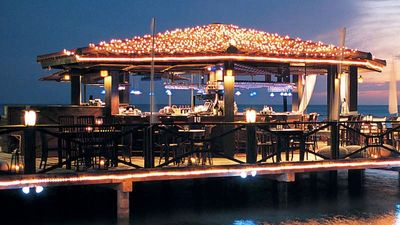 Situated on a pier, Pinchos Grill & Bar exudes a casual-chic ambiance. // © 2014 Pinchos Grill & Bar