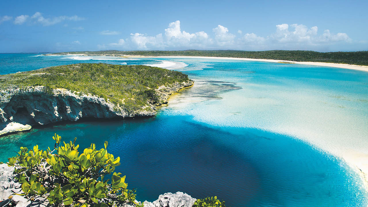 The smaller properties and emptier beaches of the Bahamas’ Out Islands, such as Long Island pictured here, may be more appealing to potential visitors.