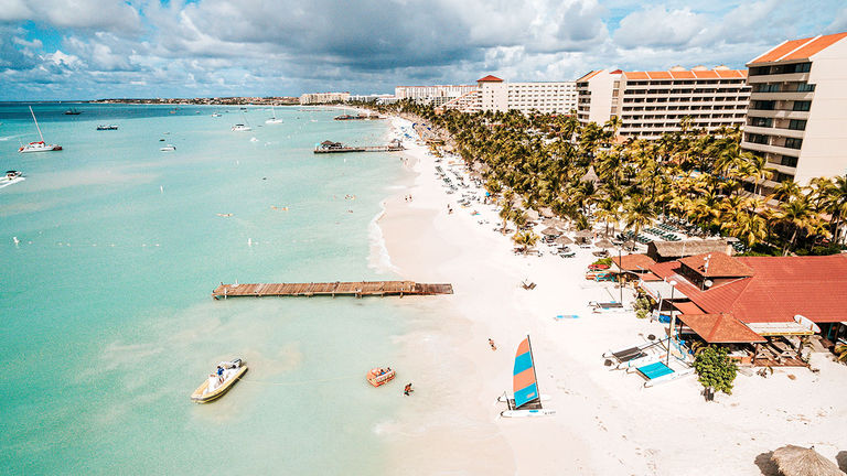 Aruba expects growth in visitors due to the sustained popularity of its program for remote workers.