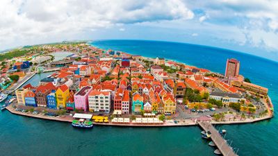 Willemstad is the capital city of Curacao, and it is widely known for its brightly colored buildings.
