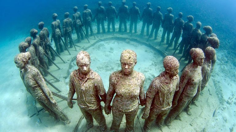 Life-size figures are part of an installation called “Vicissitudes.”